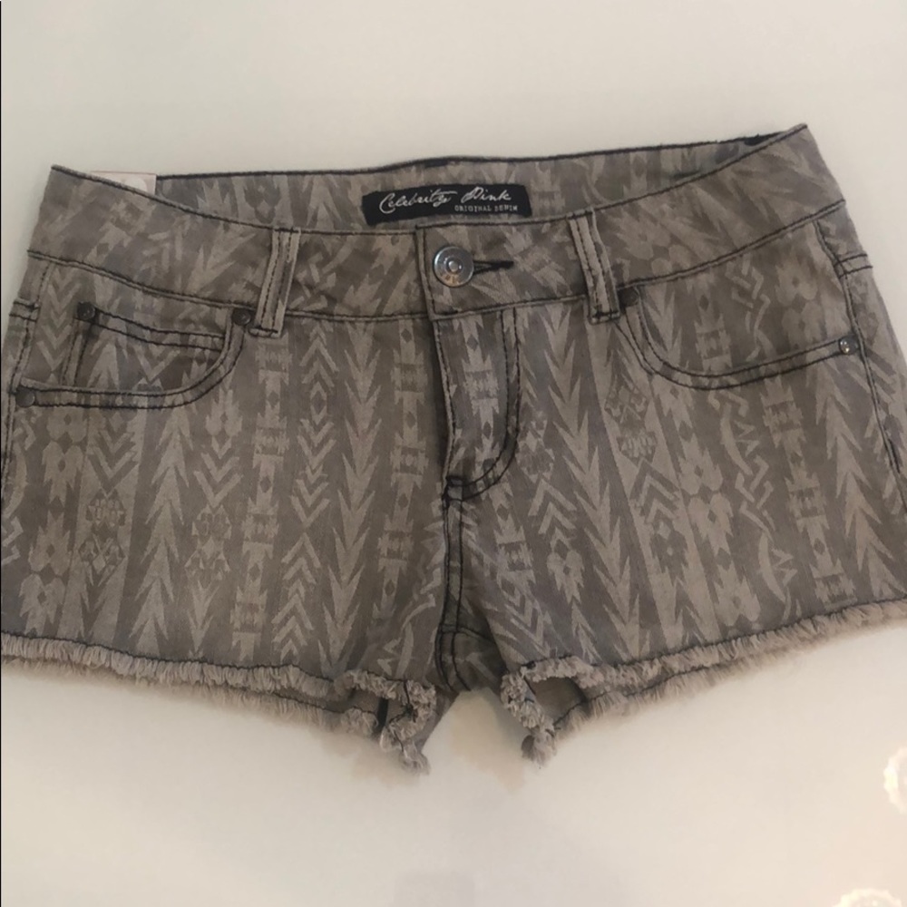 Grey tribal print stretch denim shorts
